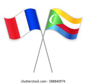 French and Comoran crossed flags. France combined with Comoros isolated on white. Language learning, international business or travel concept.