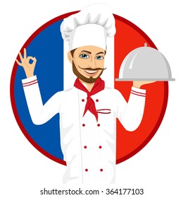 French Cuisine Chef With Funny Big Mustache Holding A Silver Tray