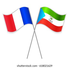 French and Equatorial Guinean crossed flags. France combined with Equatorial Guinea isolated on white. Language learning, international business or travel concept.