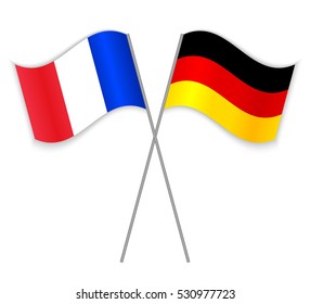 French and German crossed flags. France combined with Germany isolated on white. Language learning, international business or travel concept.