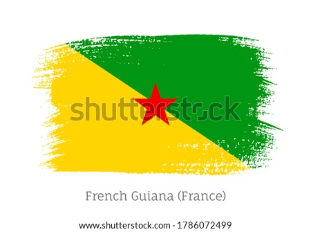 French Guiana official flag in shape of paintbrush stroke. National identity symbol for patriotic design. French Guiana overseas department and region of France. Grunge brush blot vector illustration.