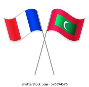 French and Maldivian crossed flags. France combined with Maldives isolated on white. Language learning, international business or travel concept.