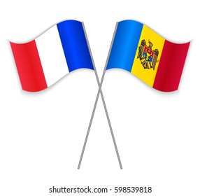 French and Moldovan crossed flags. France combined with Moldova isolated on white. Language learning, international business or travel concept.
