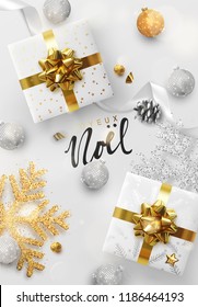 French text Joyeux Noel. Christmas vector background. Creative design greeting card, banner, poster. Top view gift box, xmas decoration balls and snowflakes. French text Joyeux Noel. Christmas vector background. Creative design greeting card, banner, poster. Top view gift box, xmas decoration balls and snowflakes.