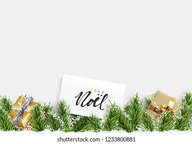 French text Joyeux Noel. Christmas banner border with green pine branches, realistic golden gifts box and white snow.