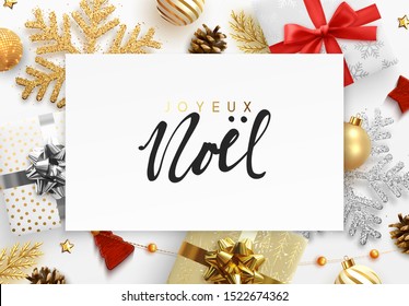 French text Joyeux Noel. Christmas background. Xmas festive decoration objects. Realistic elements of design. Merry Christmas and Happy New Year Holiday template. greeting card, web poster.