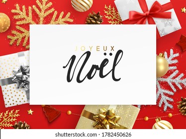 French text Joyeux Noel. Christmas and New Year background. Decoration realistic gift box, green pine branches, gold balls, decorative snowflake in glitter and tinsel. Xmas bauble. Holiday design.