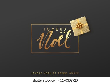 French text Joyeux Noel. Merry Christmas gold lettering in a frame background.