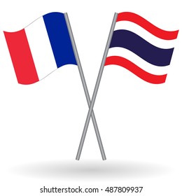 French and Thai crossed flags. France combined with Thailand isolated on white. Language learning, international business or travel concept.