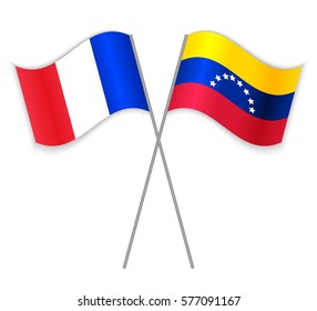 French and Venezuelan crossed flags. France combined with Venezuela isolated on white. Language learning, international business or travel concept.