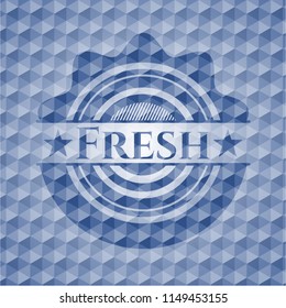 Fresh blue badge with geometric background.