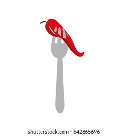 fresh chilli pepper in the fork utensil