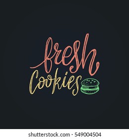 Fresh Cookies vector lettering logo, badge. Calligraphy with bakery Illustration on black background for prints, cards, posters, products packaging, branding.
