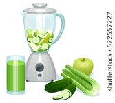 fresh cut green apples, cucumbers and celery in a glass bowl of the blender, and a glass with cocktail