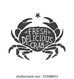 Fresh delicious crab-hand drawn white lettering inside the black shape. Vector monochrome illustration.