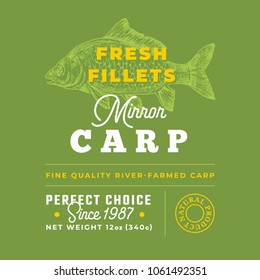 Fresh Fillets Premium Quality Label . Abstract Vector Fish Packaging Design Layout. Retro Typography with Borders and Hand Drawn Mirror Carp Silhouette Background.