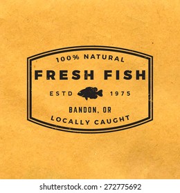 fresh fish label with grunge texture on old paper background