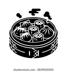 Fresh hot dumplings steaming inside bamboo basket