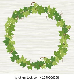 Fresh ivy leaf vector frame on white wooden texture background. 