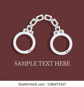 fresh metal handcuffs on a dark background