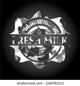 Fresh Milk on grey camouflaged texture