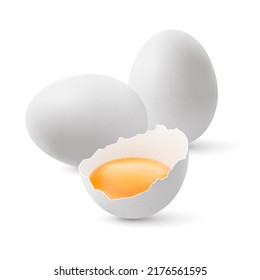 Fresh Organic Chicken Eggs on White Background. The Egg is half Broken Among the other Two Large White Eggs