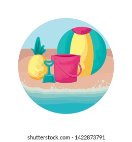 fresh pineapple with ball and bucket in beach