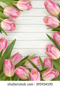 Fresh pink tulips and empty tag for text on wooden background. EPS 10 vector file included