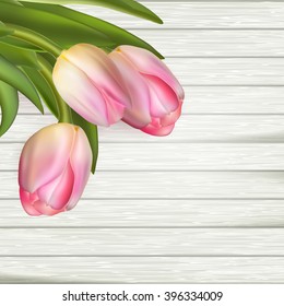 Fresh pink tulips and empty tag for text on wooden background. EPS 10 vector file included