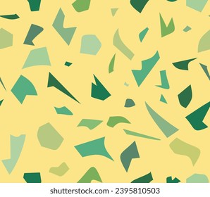 Fresh seamless terrazzo pattern of green specks on yellow backdrop. Abstract geometric spring sunny background.