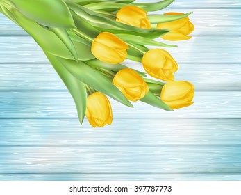 Fresh spring yellow tulips flowers on turquoise wooden planks. Selective focus. Place for text. EPS 10 vector file included