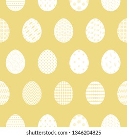 Fresh yellow Happy Easter seamless pattern with white decorated eggs. Bright orange ornamental eggs texture for Easters package, gift wrapping paper, textile, covers, background