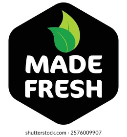 Freshly Made Product Label. Black filled hexagon design with green leaves and bold white text highlighting freshness.