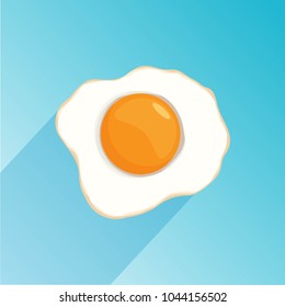 Fried egg isolated on blue background 