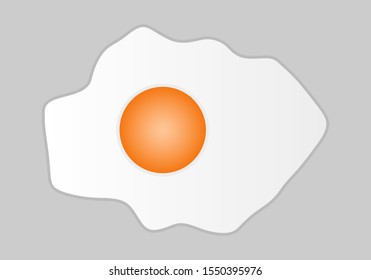 Fried egg on a gray background.