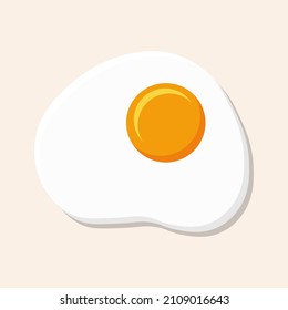 Fried egg or scrambled eggs isolated on light beige background