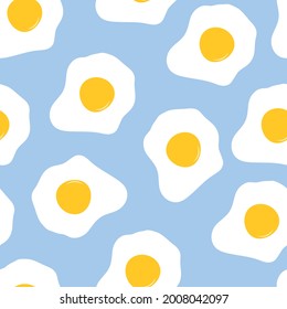 Fried egg seamless pattern on blue background.