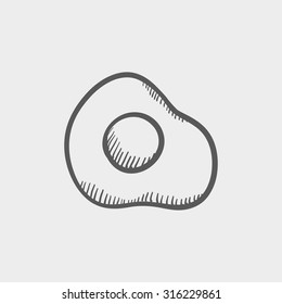 Fried egg sketch icon for web, mobile and infographics. Hand drawn vector dark grey icon isolated on light grey background.