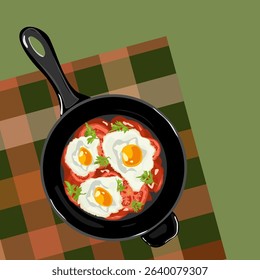 Fried egg with tomatoes and greens ia a fryer pan on the tablecloth. Shakshuka. Healthy breakfast concept background