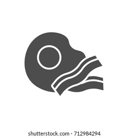 Fried eggs with bacon black icon.