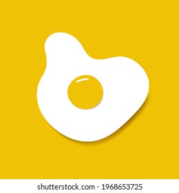 Fried eggs isolated on a yellow background. Fried egg flat icon.