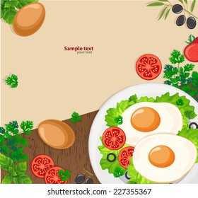 Fried eggs on a wooden background