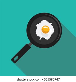 fried eggs in a pan flat style with long shadow isolated on green background. breakfast elements vector sign symbol