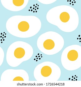 Fried eggs seamless pattern on blue background. Vector illustration. Yummy fried egg seamless pattern