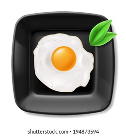 Fried eggs served on black square plate. Casual breakfast