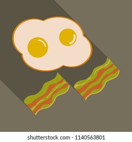 Fried eggs and slices of crisp bacon