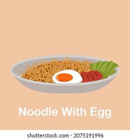Fried Noodles With Eggs On A Plate