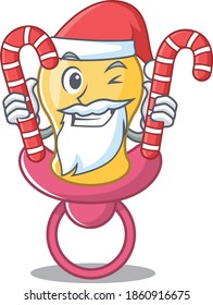 Friendly baby pacifier dressed in Santa Cartoon character with Christmas candies