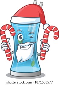 Friendly blue hawai cocktail dressed in Santa Cartoon character with Christmas candies