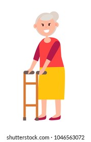 Friendly grandmother in bright long skirt with grey hair stands and holds wooden walker isolated cartoon flat vector illustration on white background.